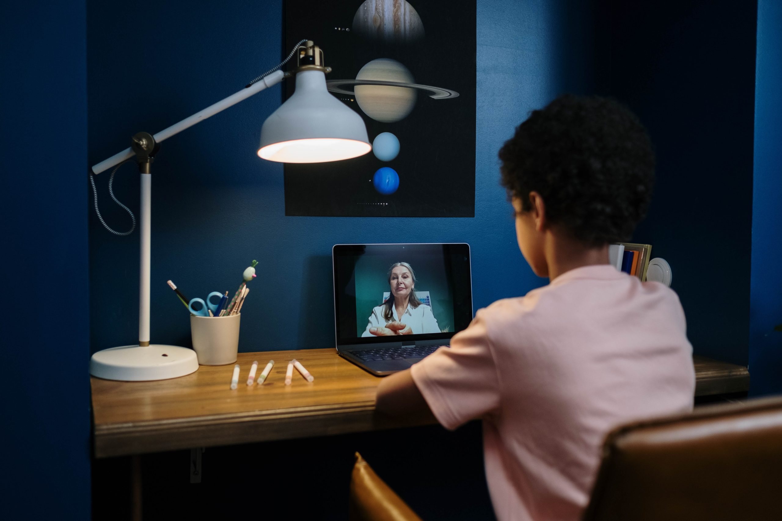 Student engagement in online learning, boy at desk